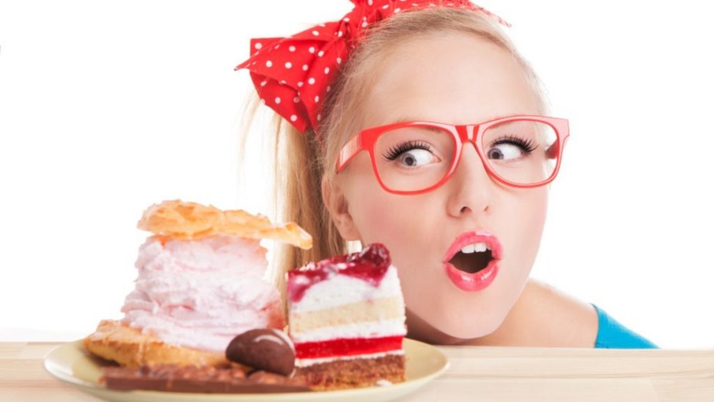 woman viewing pile of cakes - to suggest - is instant gratification ruining your long term success